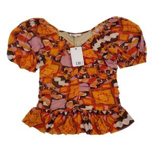 Colorful printed peplum top with puff sleeves, size M, DR2, polyester blend.